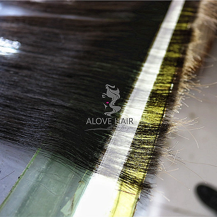 100% remy human hair tape in extensions wholesale